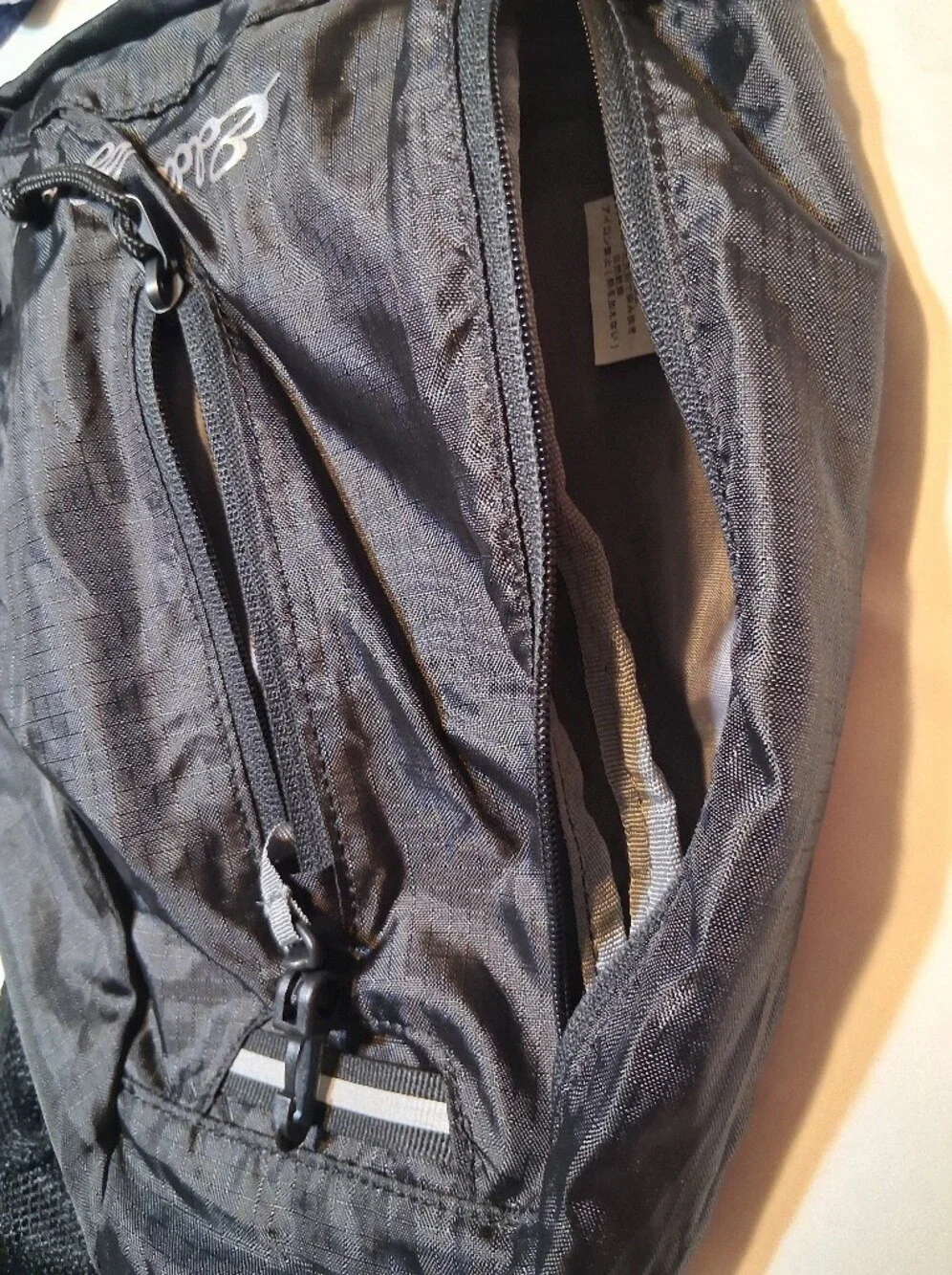 Eddie Bauer Stowaway 10L Onyx Black Packable Sling Backpack Crossbody Daypack
